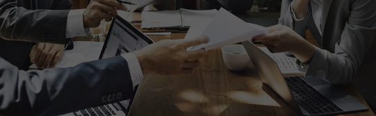 people doing business paperwork