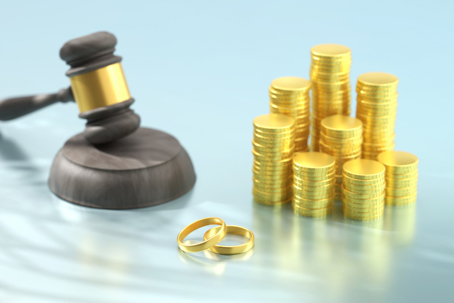 Gavel, wedding rings, and coins