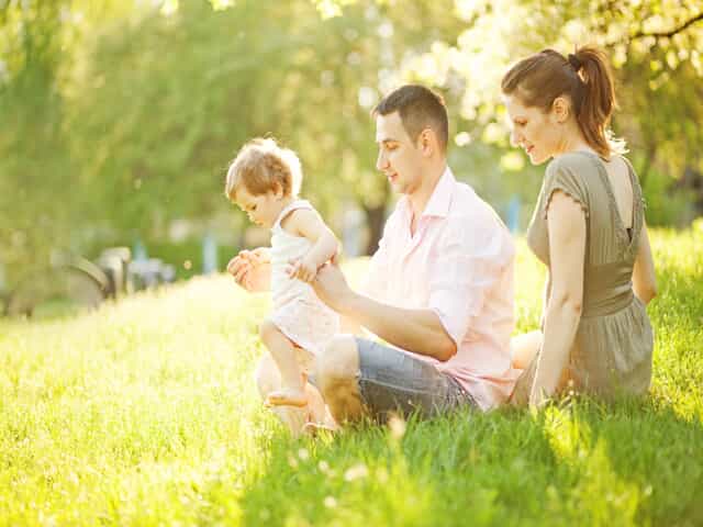 Parents Visiting With Child